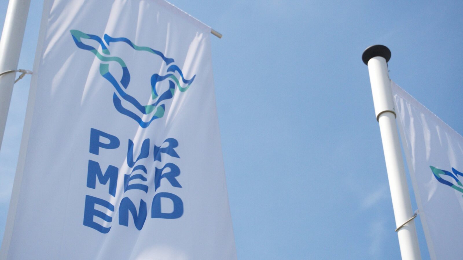 Een banner met het logo van de gemeente Purmerend.